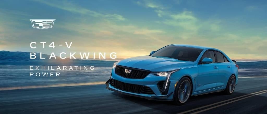 Cadillac CT4-V Blackwing driving at sunset.